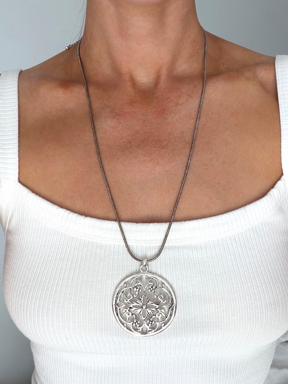 Etienne Aigner Large Silver Floral Disc Pendant Necklace